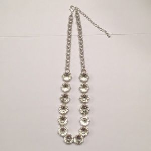 Silver colored necklace with rhinestones